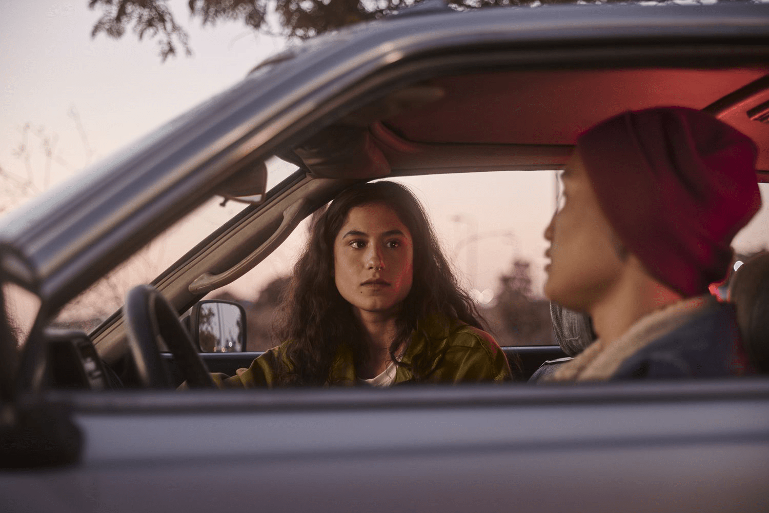 Young mixed race couple angry at each other inside car Young mixed race couple angry at each other inside car