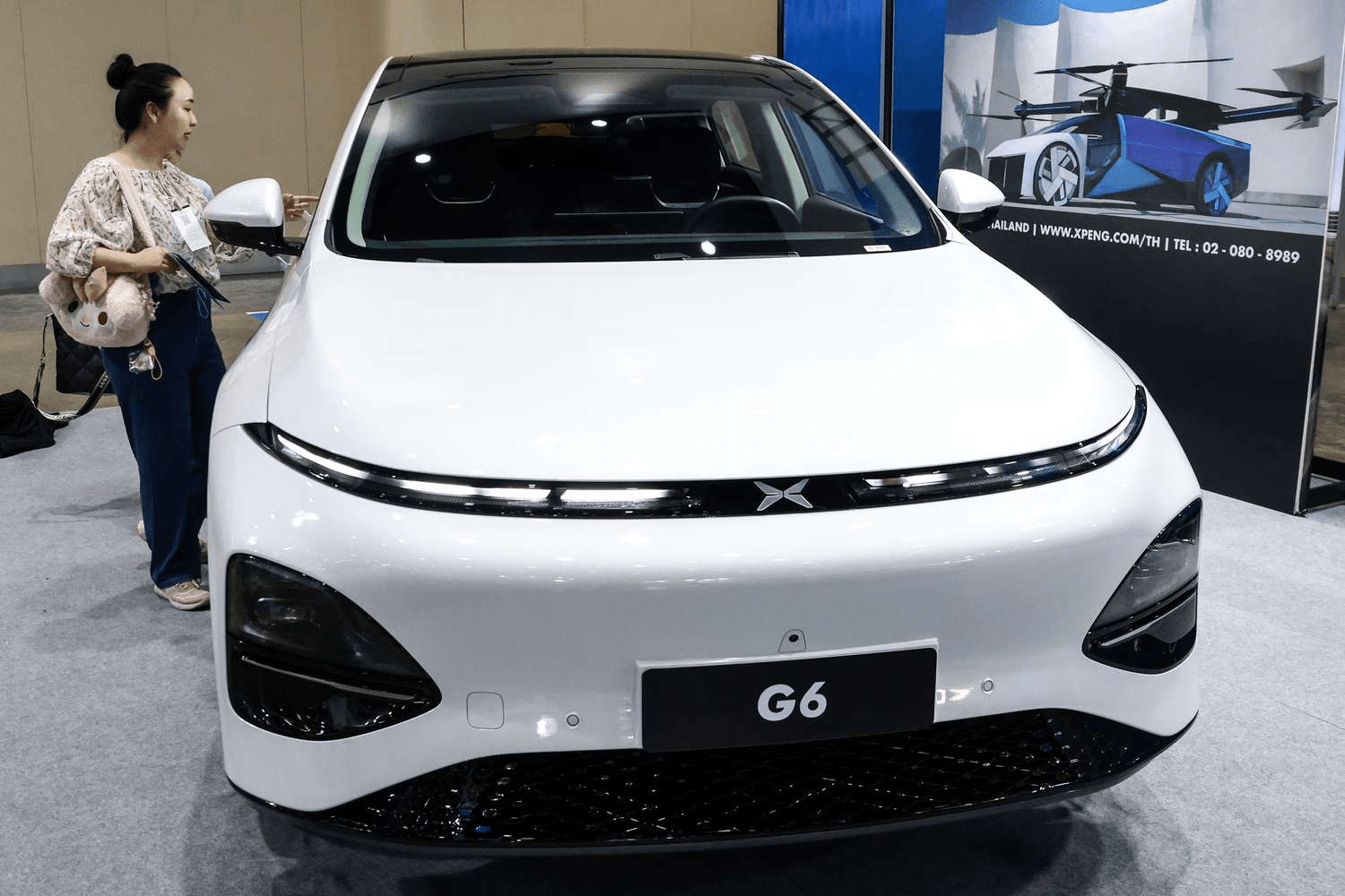 XPeng: Как сотрудничество с Volkswagen помогает снизить убытки, несмотря на снижение выручки