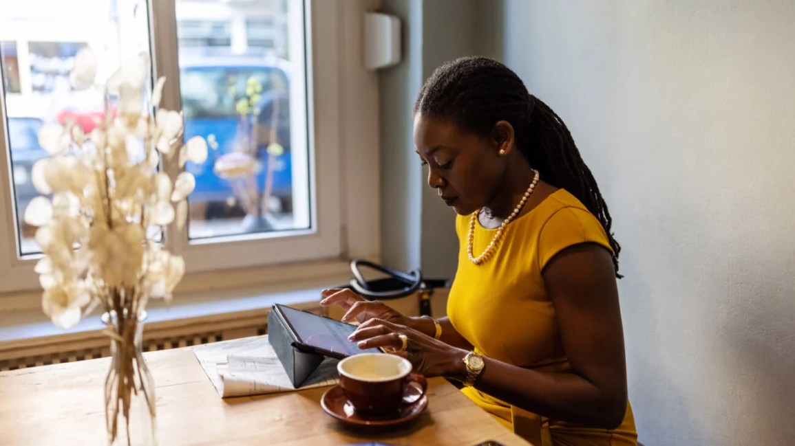 person using a tablet to look up health information