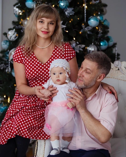 Tatiana Kuvshinnikova with her husband and daughter