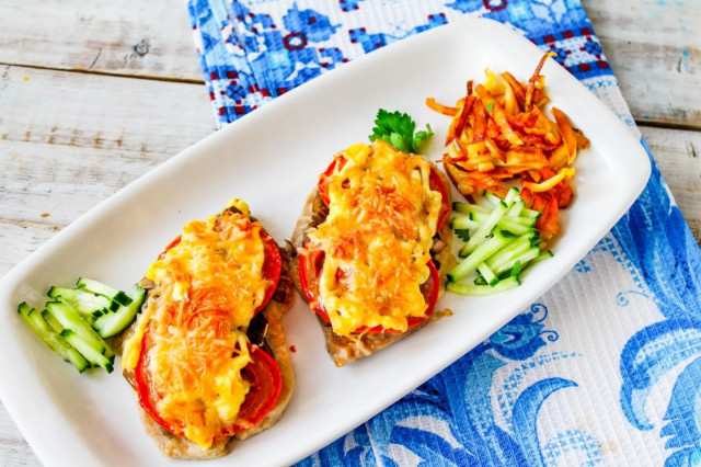 Delicious Baked Pork Medallions with Mushrooms, Tomatoes, and Cheese