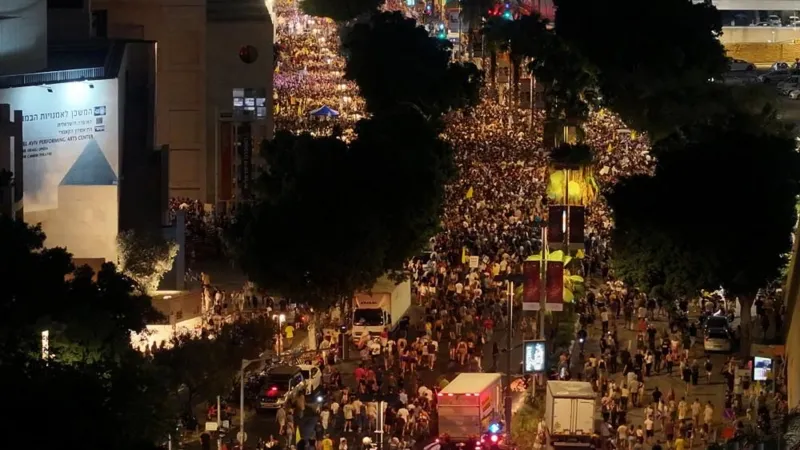 Reuters A drone view shows hundreds of people protesting after families of hostages called for a nationwide strike
