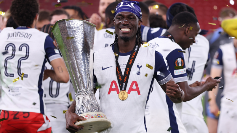 Tottenham's Yves Bissouma celebrates with the Europa League trophy