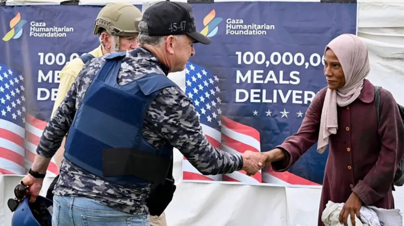 Office of United States Special Envoy to the Middle East Steve Witkoff shakes hands with a woman wearing a headscarf