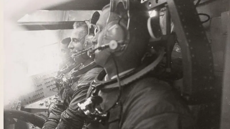 Getty Images The crew of Apollo 8 in training. They are shown strapped into their seats.
