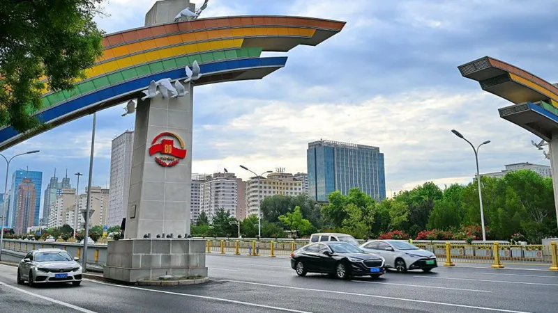 Getty Images A themed installation is set up on a rainbow-shaped gate on Chang'an Avenue.