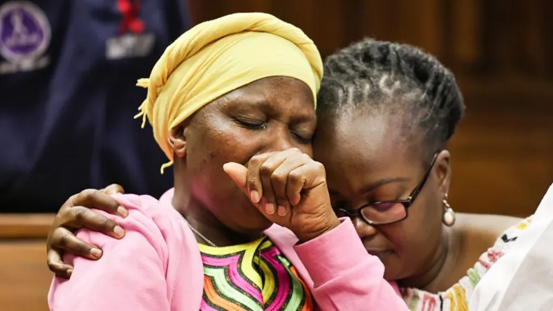 Family members embrace in Johannesburg High Court, South Africa, during the trial of Amantle Samane, 1 September 2025