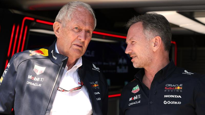 Helmut Marko speaks with Christian Horner at the Italian Grand Prix in May