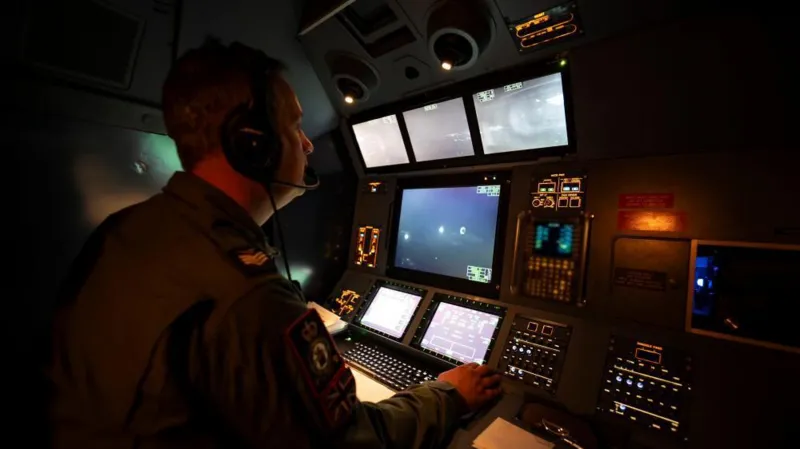 PA Media An RAF Mission System Operator observes and commands FGR4 Typhoons from the cockpit of an RAF 'Eastern Sentry' deployment over Poland