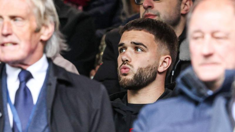 Rangers' Nicolas Raskin sits in the stands during a William Hill Premiership match between Rangers and Heart of Midlothian at Ibrox Stadium