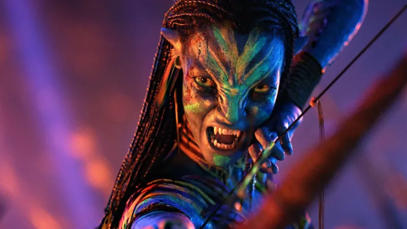 20th Century Studios Zoe Saldana as Neytiri te Tskaha Mo'at'ite in Avatar, pictured holding a bow and arrow