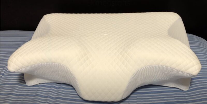 Orthopedic pillow with shoulder cutouts
