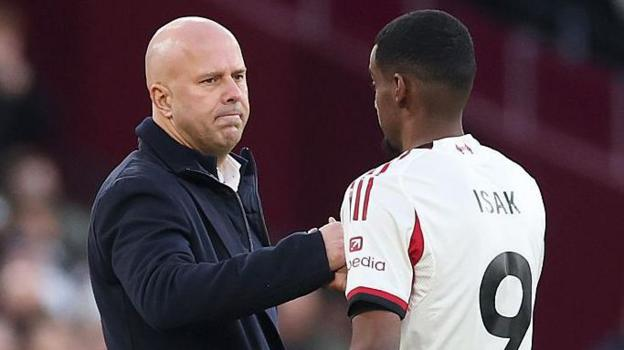 Liverpool head coach Arne Slot congratulates Alexander Isak as he comes off against West Ham United.
