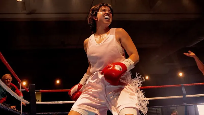 Black Bear Sydney Sweeney in Christy, wearing a bear of boxing gloves while fighting in the ring