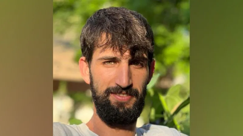 The Hostages and Missing Families Forum Guy Illouz. He has dark hair and a beard