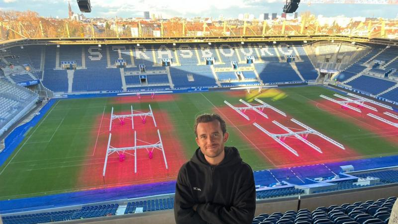 Ben Chilwell posing for a photo at Strasbourg's La Meinau Stadium