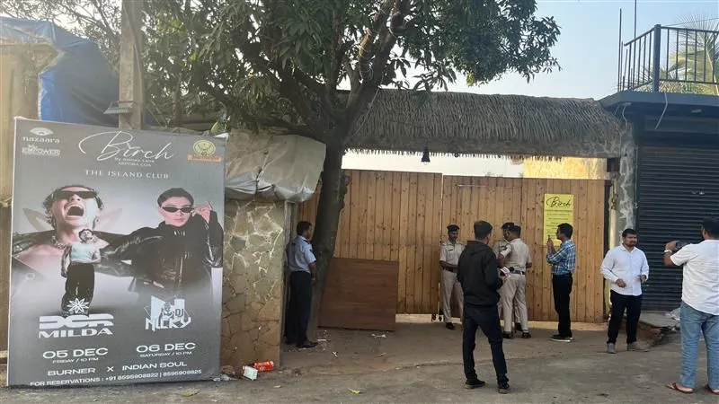 Officials outside the Birch nightclub in Goa