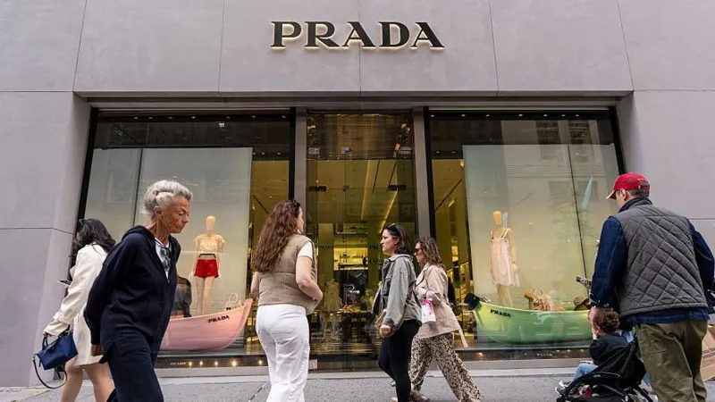 Prada Completes Versace Buy for About £1.04 Billion